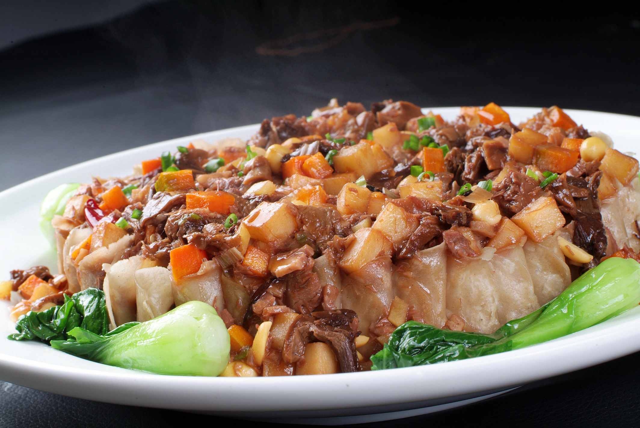 苔蘑羊肉烤姥姥高清图片