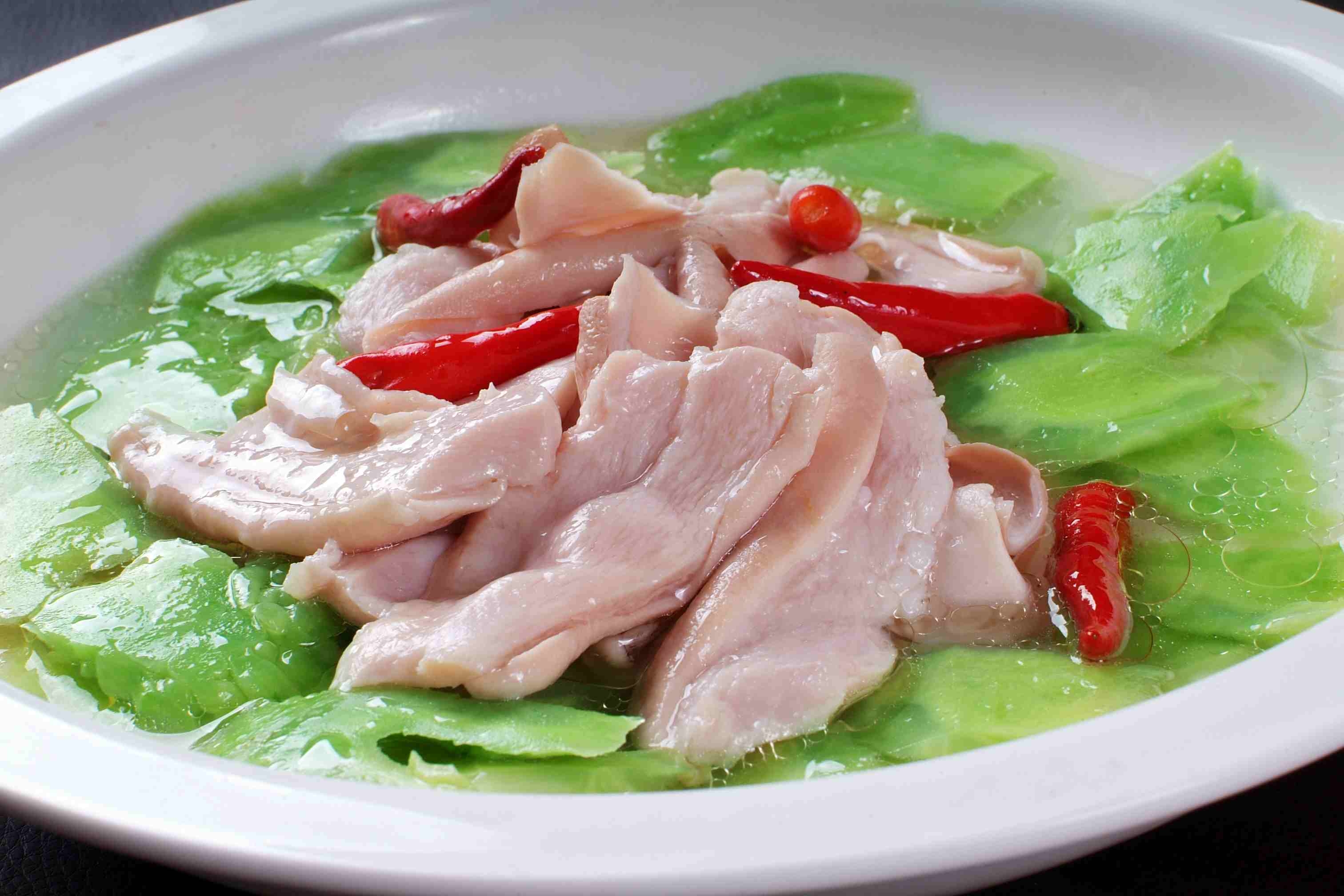 酸苦瓜烩肚片高清图片