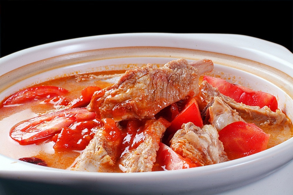 餐饮美食川菜番茄炖排骨高清图片