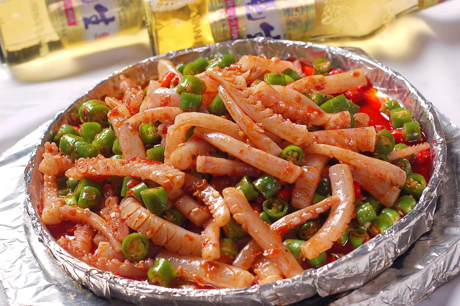 餐饮美食川菜秘制鱿鱼须高清图片