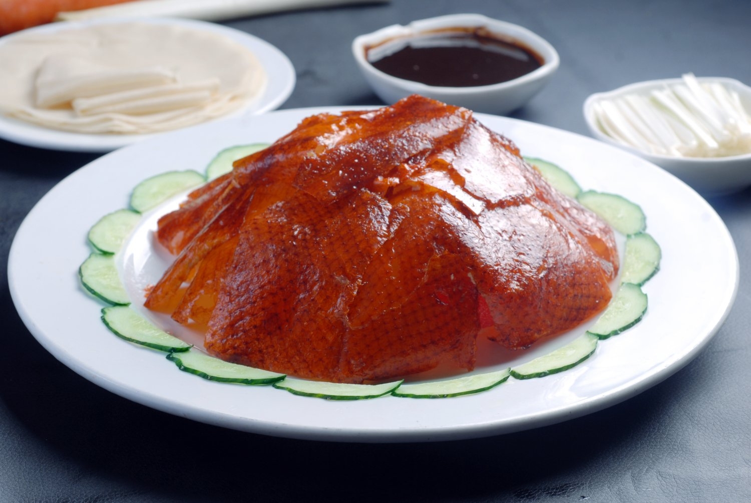 餐饮美食洺厨片皮鸭高清图片