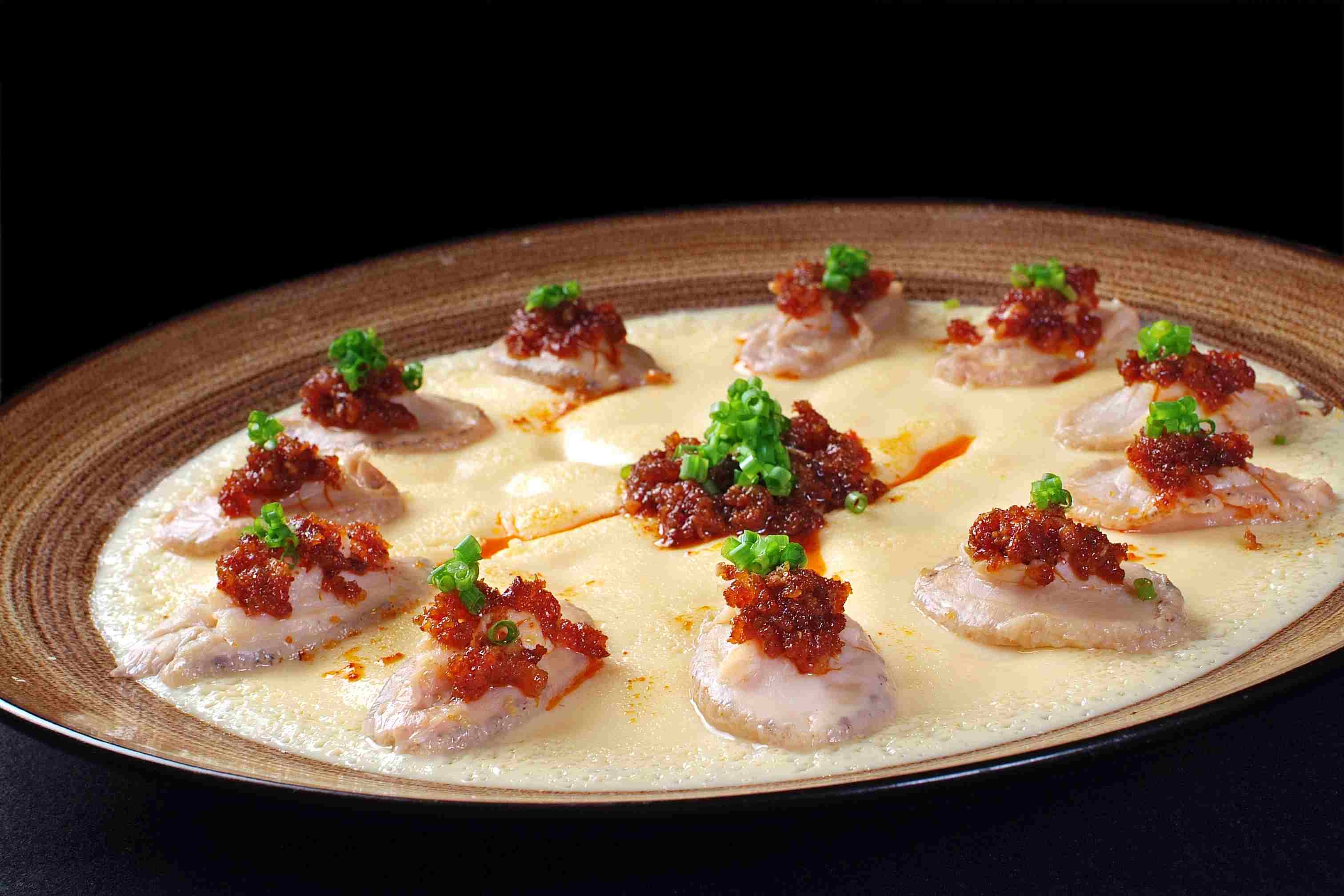 餐饮美食土蛋鲍鱼仔高清图片