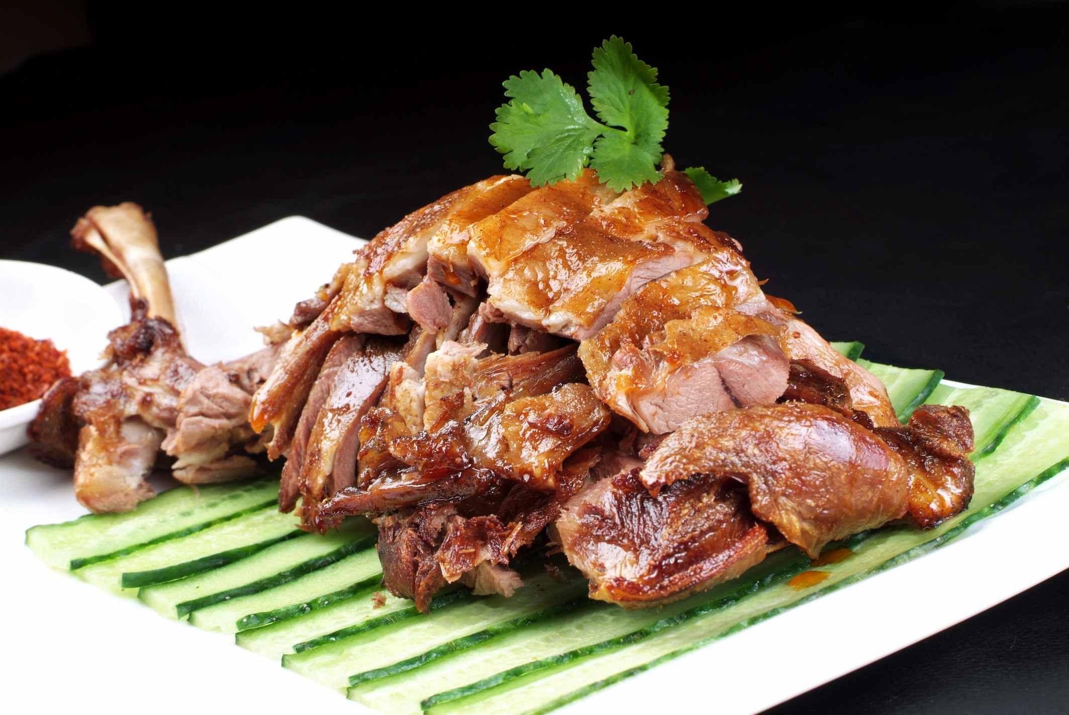 招牌烤羊腿高清图片
