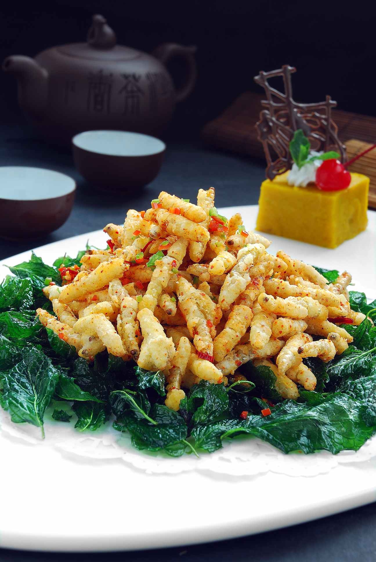 高清图片餐饮美食川菜糊辣薄荷叶炒竹蛹高清图片