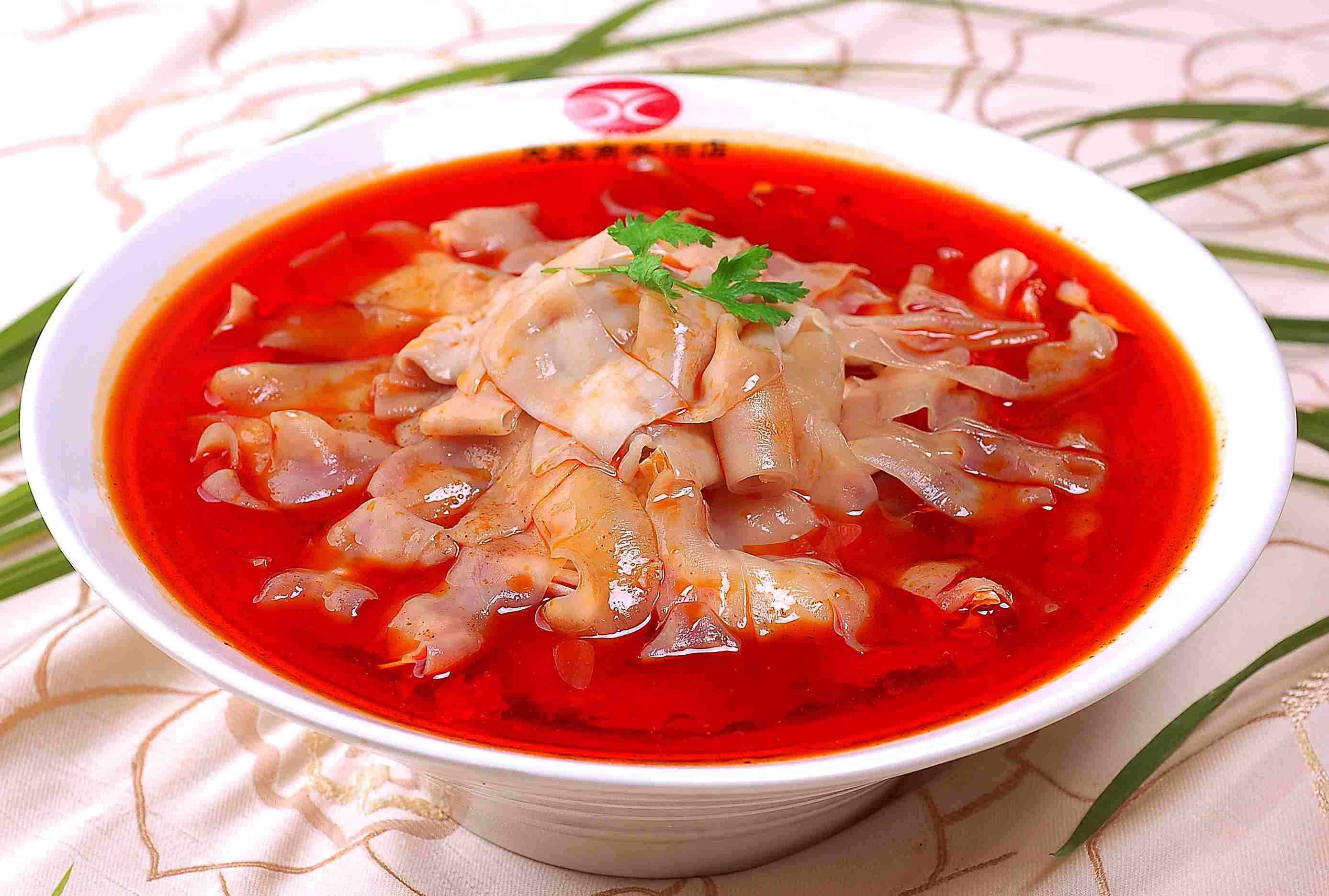 餐饮美食红汤鹅肠高清图片